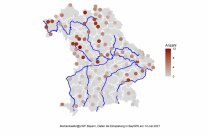 Grau gefärbte Bayernkarte mit unterschiedlich hellen braunen Punkten.