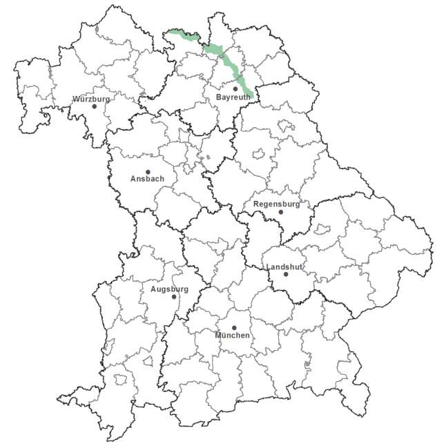 Die Karte zeigt das Bundesland Bayern. Zusätzlich sind die Grenzen der bayerischen Regierungsbezirke zu erkennen. Die ausgewählte Region ist als grüner Flächenumriss gekennzeichnet. Die Region Bruchschollenland liegt in Oberfranken. 
