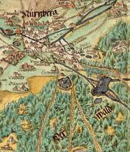 Das Bild zeigt eine historische, handgemalte Karte mit der Stadt Nürnberg und seiner Umgebung mit Wald und Feldern