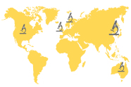 Weltkarte mit Mikorskopen auf den Gebieten USA, England, Skaninavien, China/Japan sowie Australien