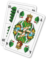 Zwei Spielkarten mit grünen Blättern.